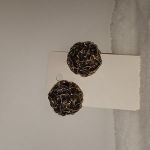 VINTAGE Schiaparelli . Gold toned clip on